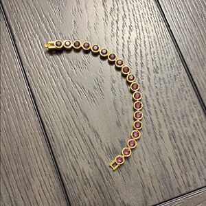 Touchstone Crystal Gold and Purple Bracelet